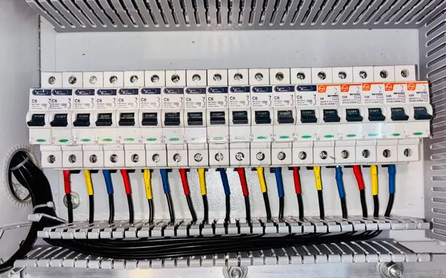 New circuit breaker panel replacing old fuse box